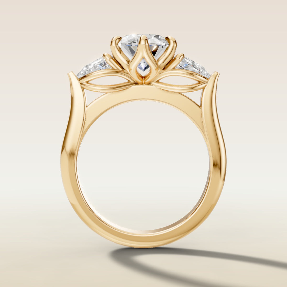 Oval Six Petal Tulip Three Stone engagement ring in yellow gold, front view
