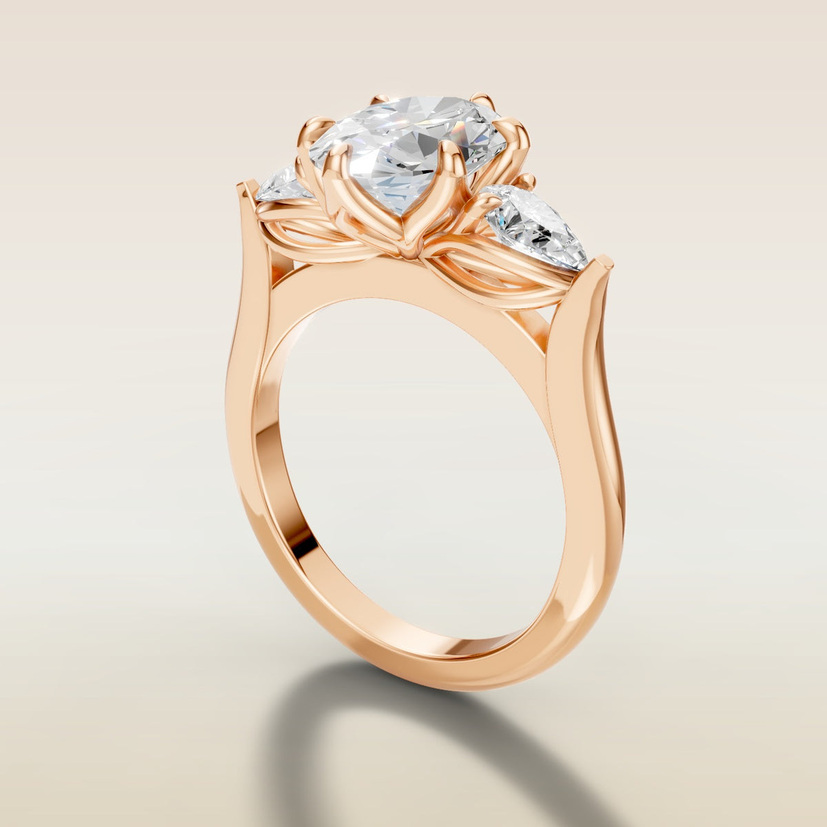 Oval Six Petal Tulip Three Stone engagement ring in rose gold, angled side view