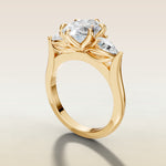 Oval Six Petal Tulip Three Stone engagement ring in yellow gold, angled side view