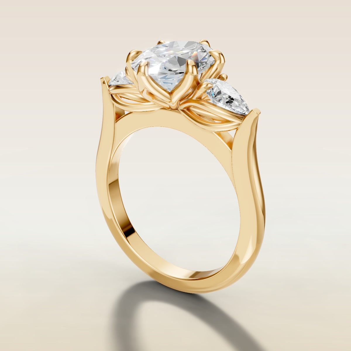 Oval Six Petal Tulip Three Stone engagement ring in yellow gold, angled side view