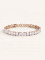 Oval shaped diamond tennis bracelet in 14K rose gold