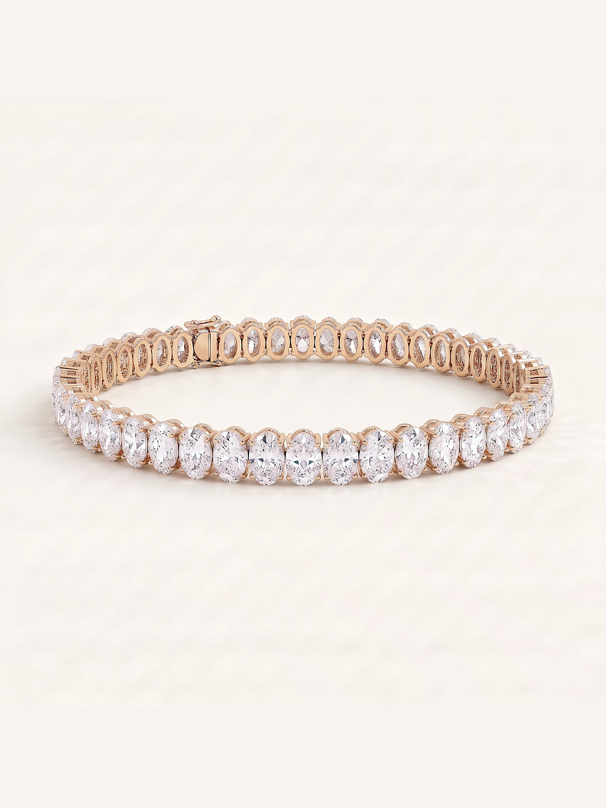 Oval shaped diamond tennis bracelet in 14K rose gold