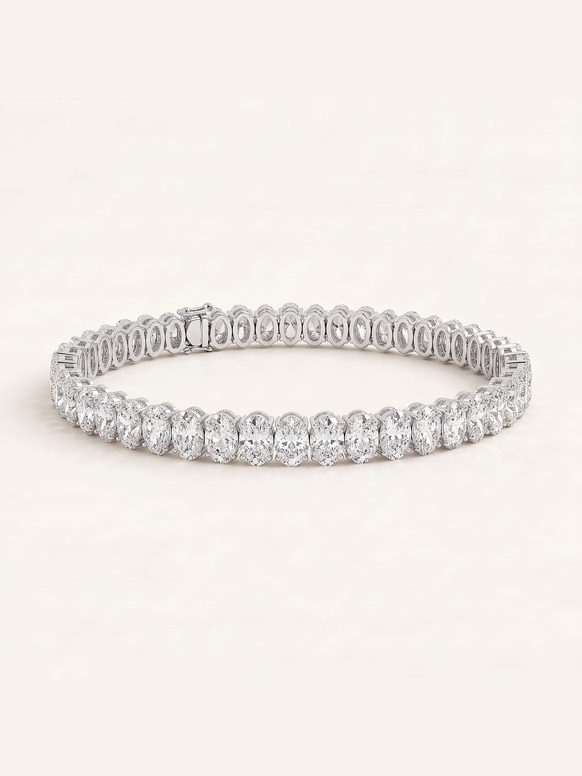 Oval shaped diamond tennis bracelet in 14K white gold