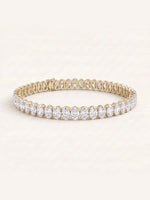 Oval shaped diamond tennis bracelet in 14K yellow gold