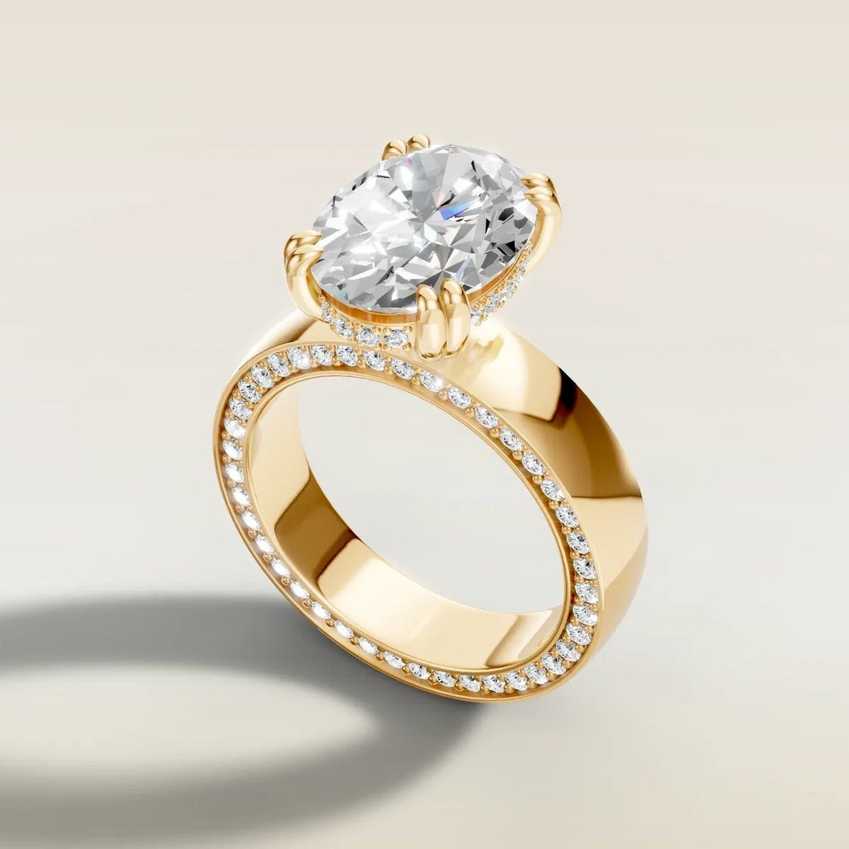 Oval Thick Band Hidden Pave engagement ring in yellow gold, angled side view