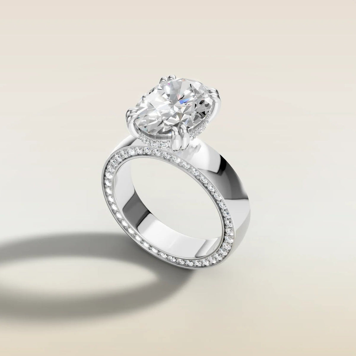 Oval Thick Band Hidden Pave engagement ring in white gold, angled side view