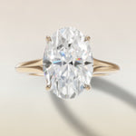 Oval Tulip Diamond Bridge Split Shank engagement ring in yellow gold, top view