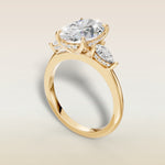 Oval Tulip Three Stone Hidden Halo engagement ring in yellow gold, back angle