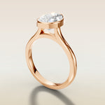 Pear Full Bezel Cathedral engagement ring in rose gold, angled side view