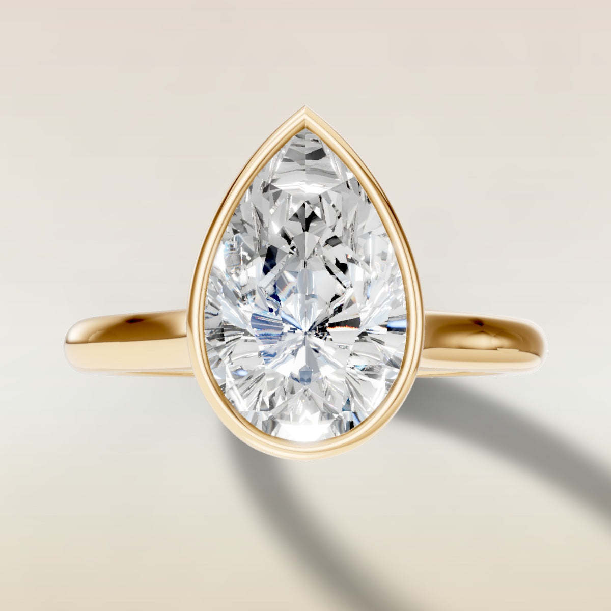 Pear Full Bezel Cathedral engagement ring in yellow gold, top view