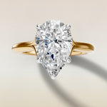 Pear Half Petal Tulip Split Shank engagement ring in gold, top view
