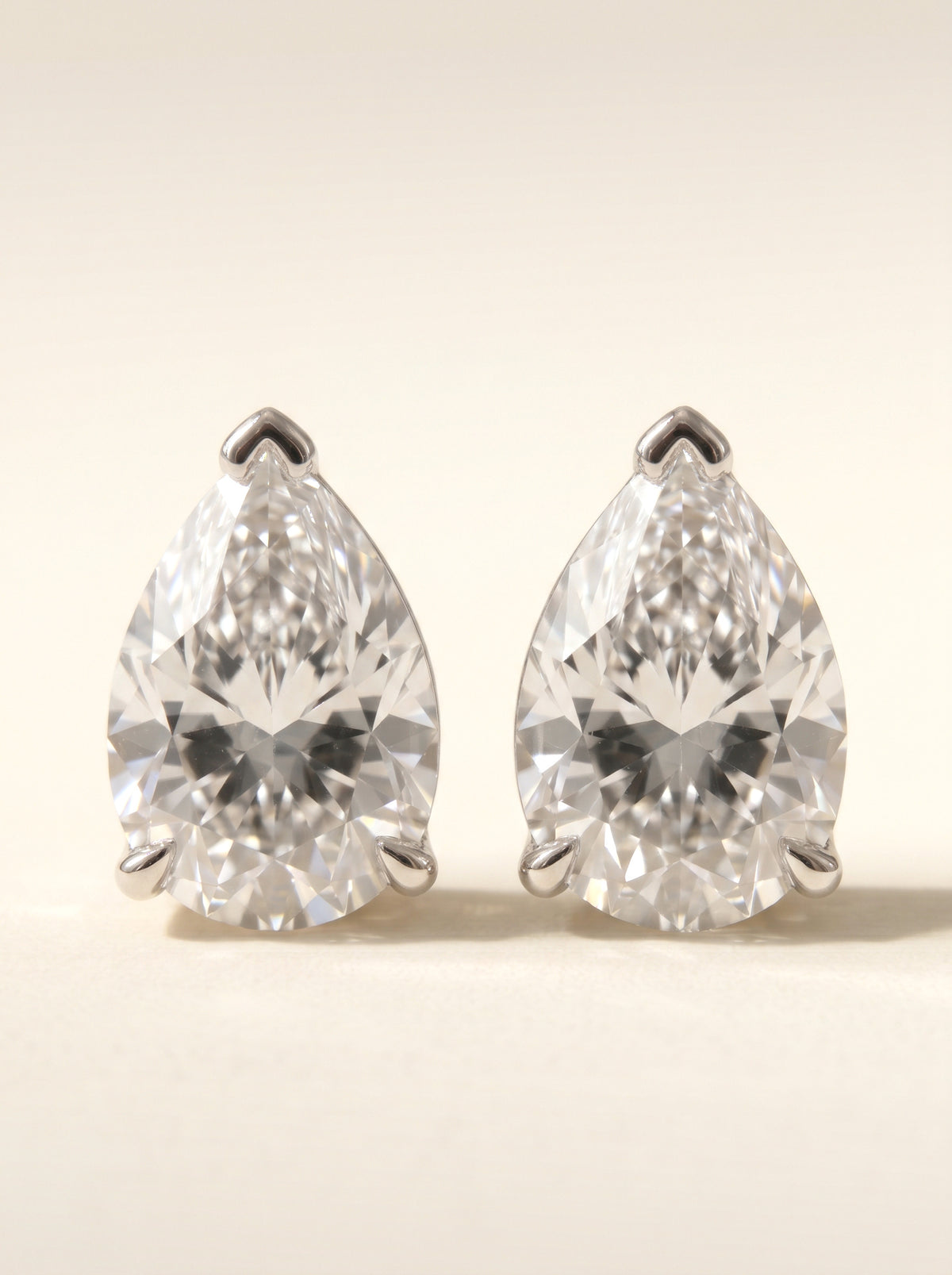 Pear diamond stud earrings in 14K white gold