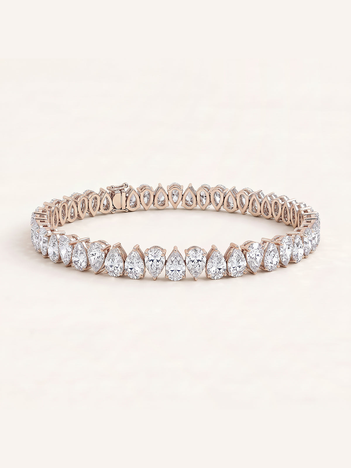 Pear shaped diamond tennis bracelet in 14K rose gold