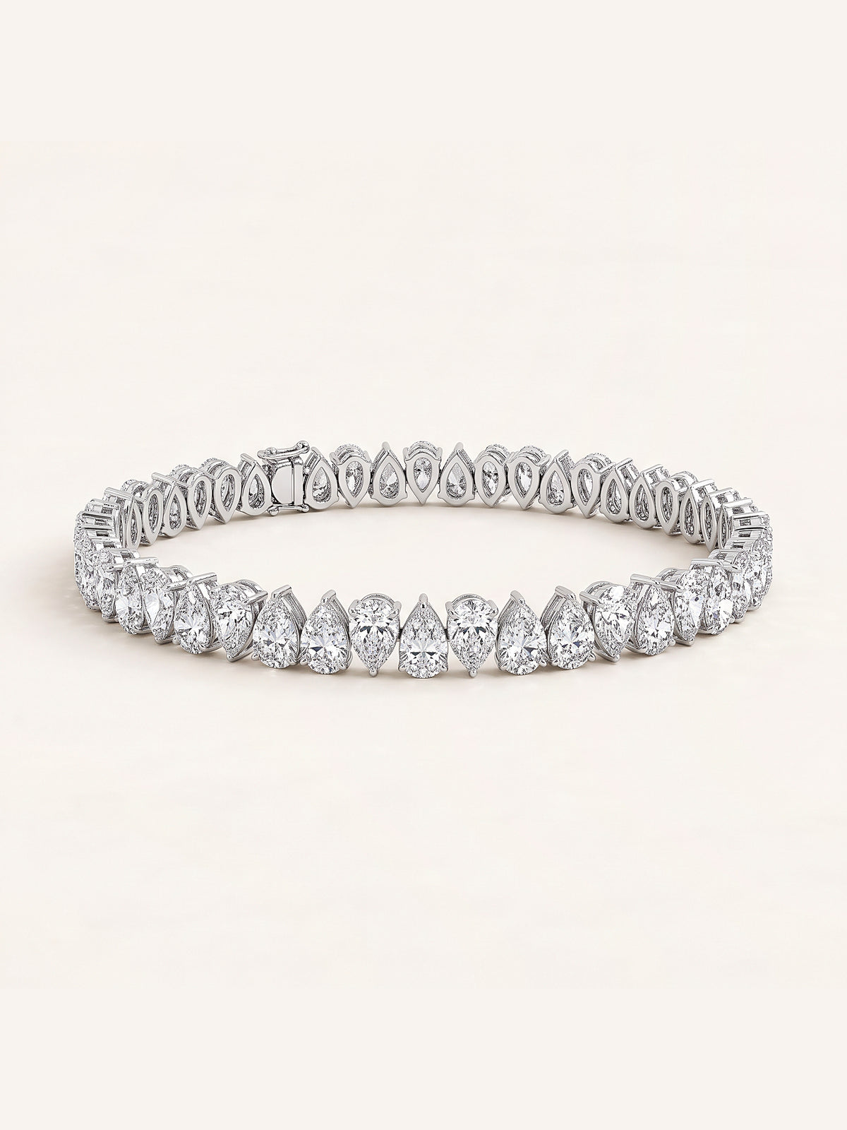 Pear shaped diamond tennis bracelet in 14K white gold
