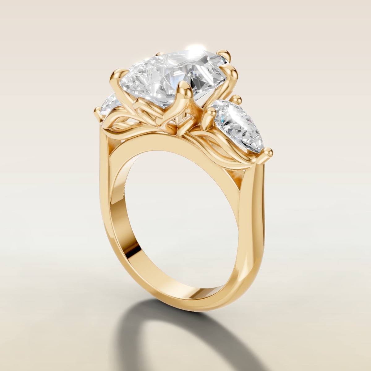 Pear Tulip Three Stone Diamond Bridge engagement ring in yellow gold, angled side view