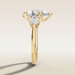 Pear Tulip Three Stone Diamond Bridge engagement ring in yellow gold, side profile