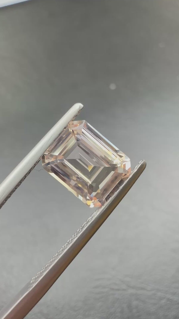 3.04ct Emerald Cut Peach Sapphire