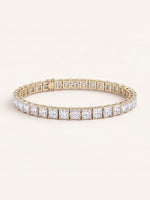 Princess shaped diamond tennis bracelet in 14K yellow gold