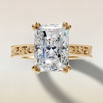 Radiant Hidden Halo Floral Engraved engagement ring in yellow gold, top view