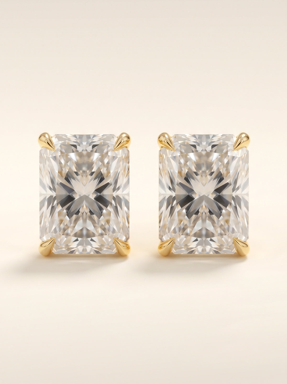 Radiant diamond stud earrings in 14K yellow gold