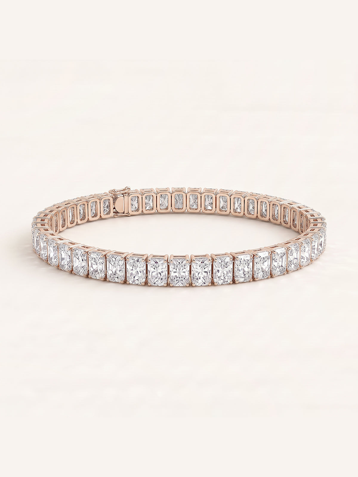Radiant shaped diamond tennis bracelet in 14K rose gold