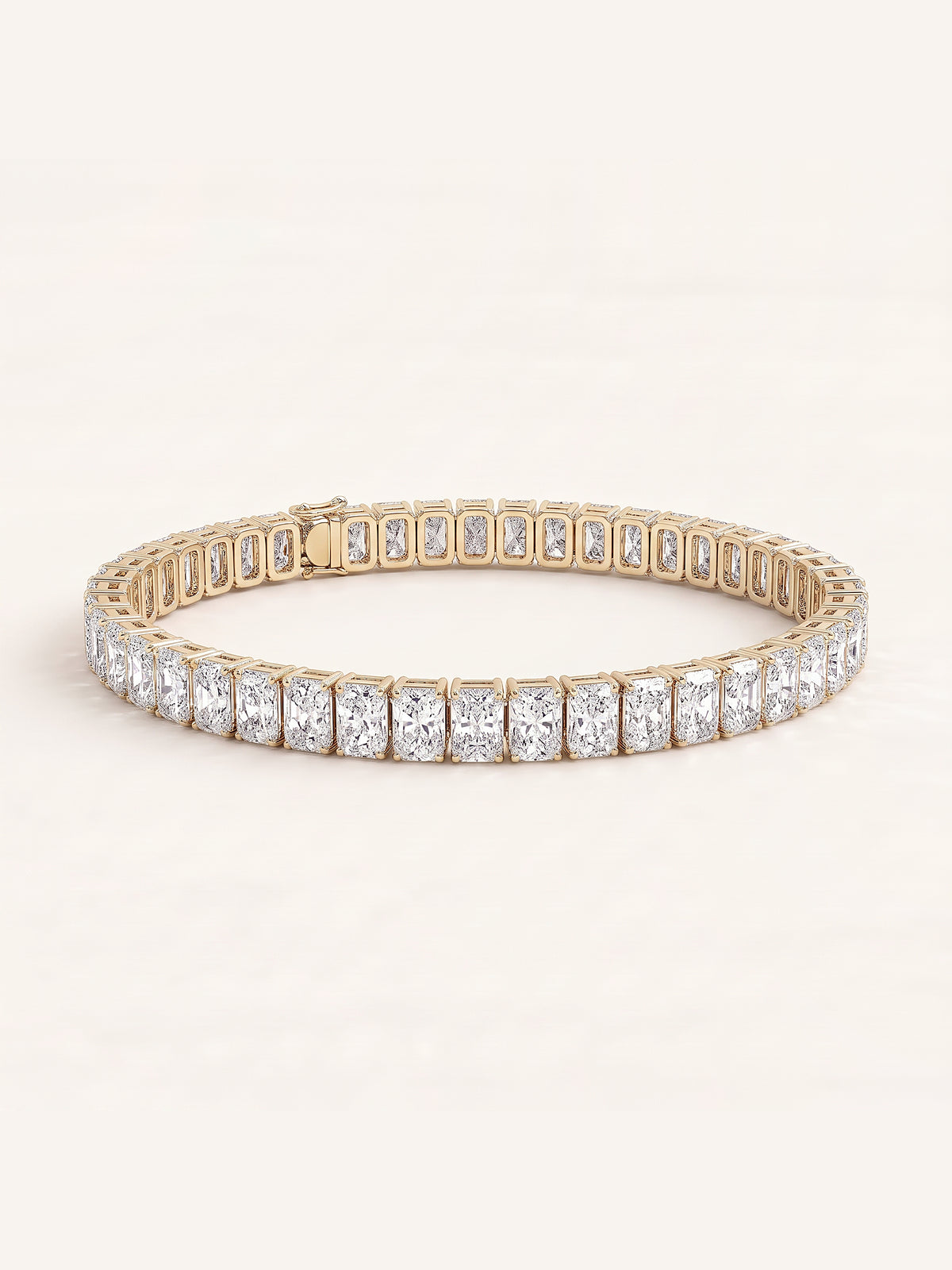 Radiant shaped diamond tennis bracelet in 14K yellow gold
