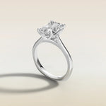 Radiant Tulip Curved Gallery Rail engagement ring in white gold, angled side view