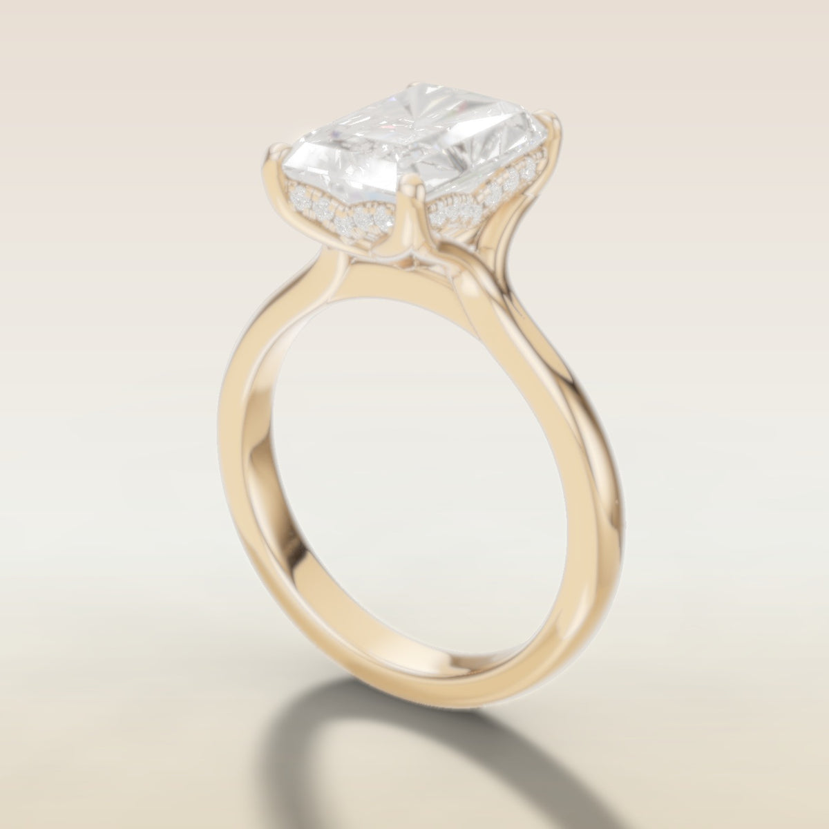 Radiant Tulip Curved Hidden Halo Split Shank engagement ring in yellow gold, angled side view