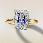 Radiant Tulip Curved Hidden Halo Split Shank engagement ring in yellow gold, top view