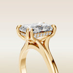 Radiant Tulip Hidden Halo Double Prong Split Shank engagement ring in gold, basket close up
