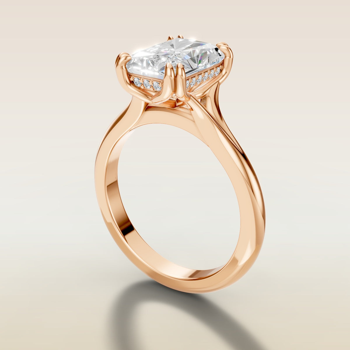 Radiant Tulip Hidden Halo Double Prong Split Shank engagement ring in rose gold, angled side view