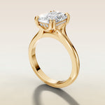 Radiant Tulip Hidden Halo Double Prong Split Shank engagement ring in gold, angled side view