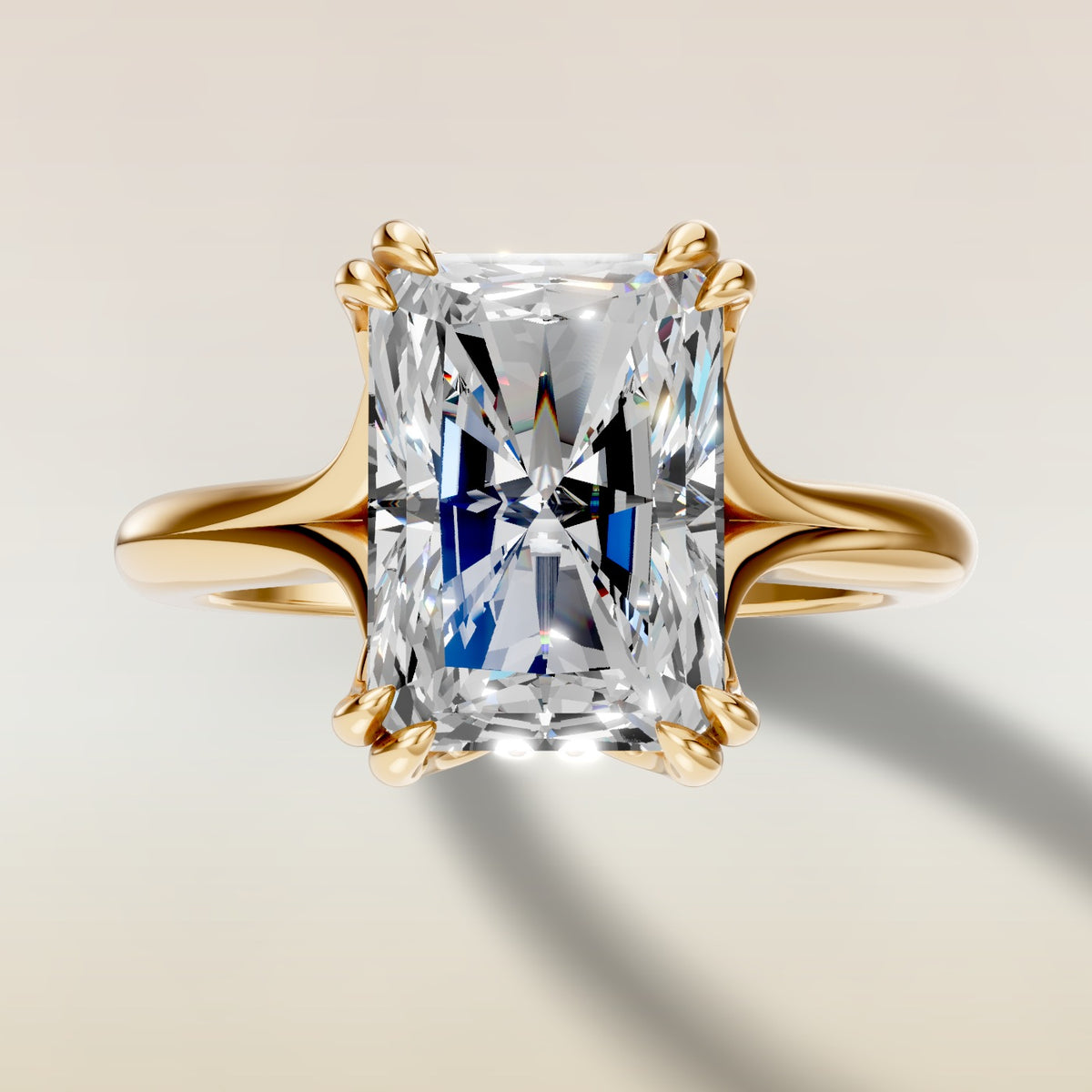Radiant Tulip Hidden Halo Double Prong Split Shank engagement ring in gold, top view