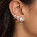 Round brilliant lab grown diamond stud earrings worn in 0.5, 1.5 and 3.0 carat sizes
