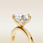 Round Six Petal Tulip Solitaire engagement ring in yellow gold, basket close up