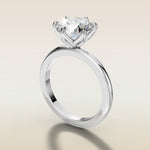 Round Six Petal Tulip Solitaire engagement ring in white gold, angled side view