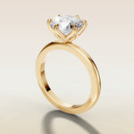 Round Six Petal Tulip Solitaire engagement ring in yellow gold, angled side view