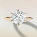 Round Six Petal Tulip Solitaire engagement ring in yellow gold, top view
