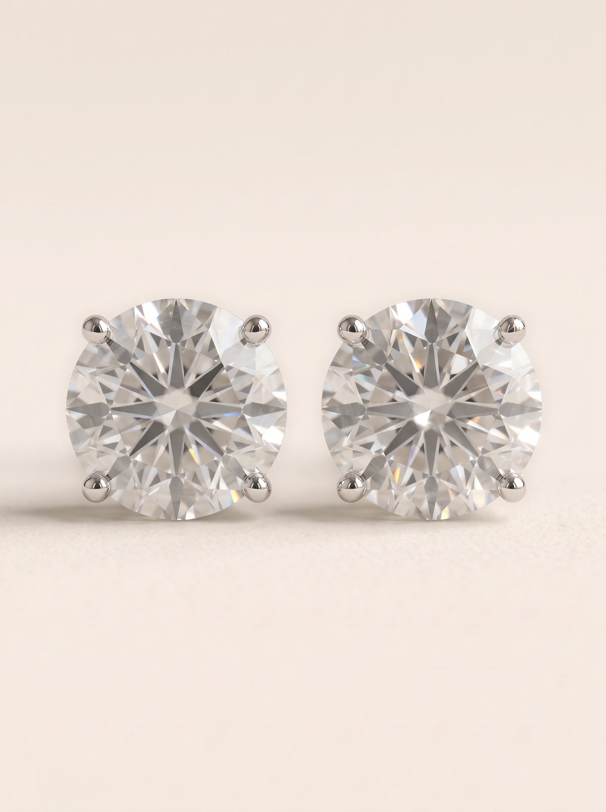 Round diamond stud earrings in 14K white gold