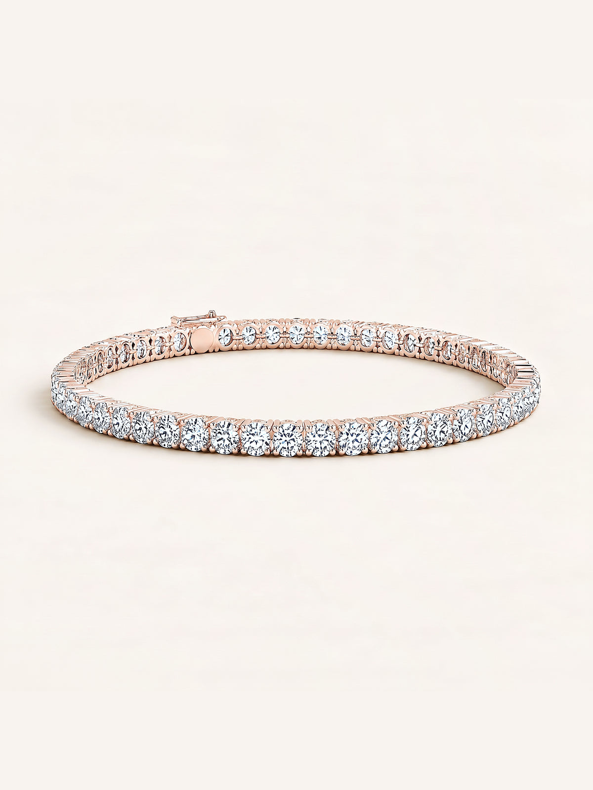 Round shaped diamond tennis bracelet in 14K rose gold