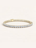 Round shaped diamond tennis bracelet in 14K yellow gold