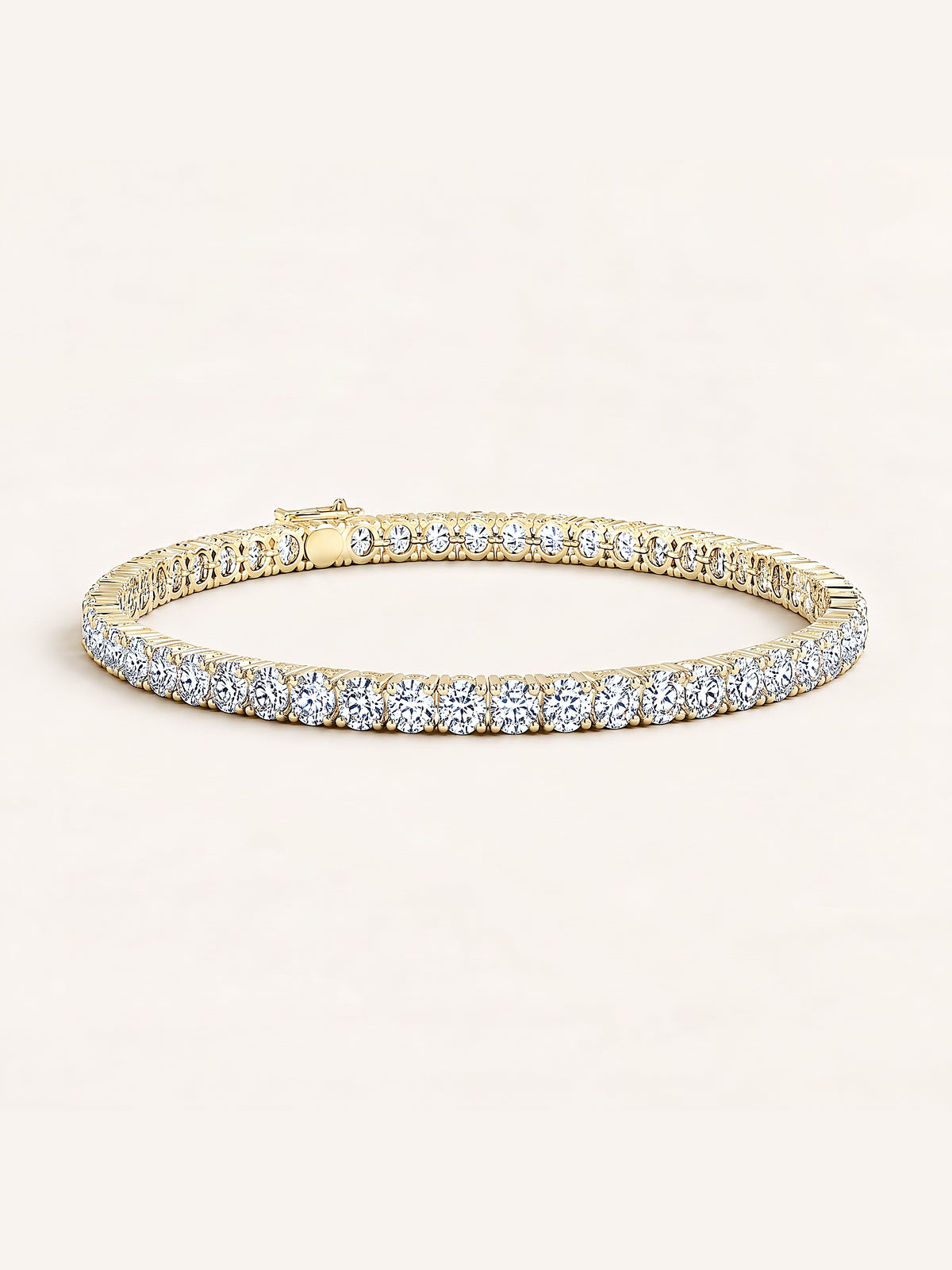 Round shaped diamond tennis bracelet in 14K yellow gold