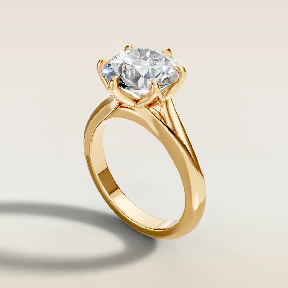 Round Tulip Split Shank engagement ring in yellow gold, angled side view