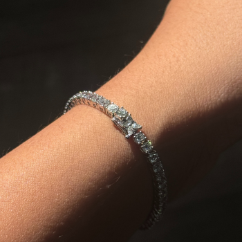 Flower clasp round lab grown diamond tennis bracelet detail view